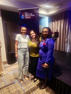Carolina Arias and Evelyn Moreno, representatives of the firm AFRA, together with an expert at the BVI FSC Meet the Regulator forum in Panama on corporate compliance.
